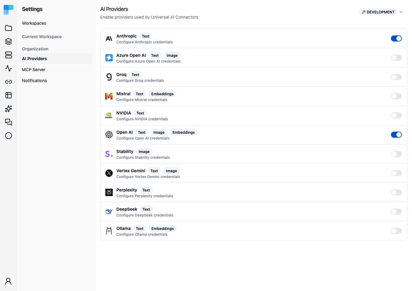 The AI Providers page — each provider with capability badges and an enable toggle